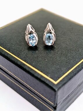 Sterling Silver Blue Topaz Oval Stud Earrings 2527
